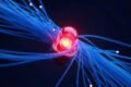 PHP2Shell illustration with blue fiber-optic strands around a red alert core